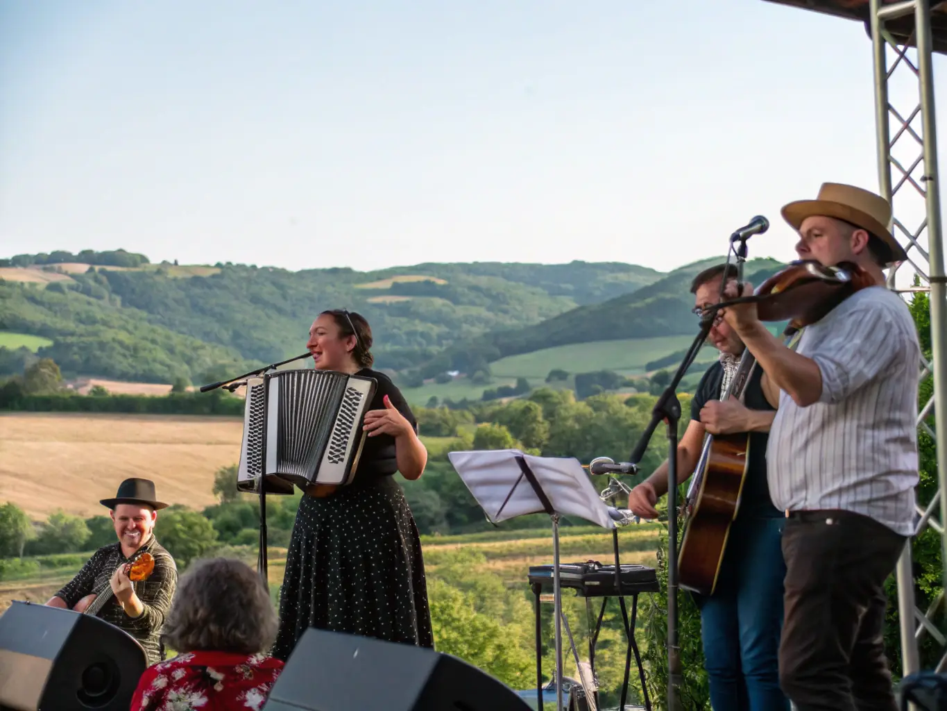 A photograph capturing a lively traditional music performance, highlighting the cultural richness and community spirit of the event.
